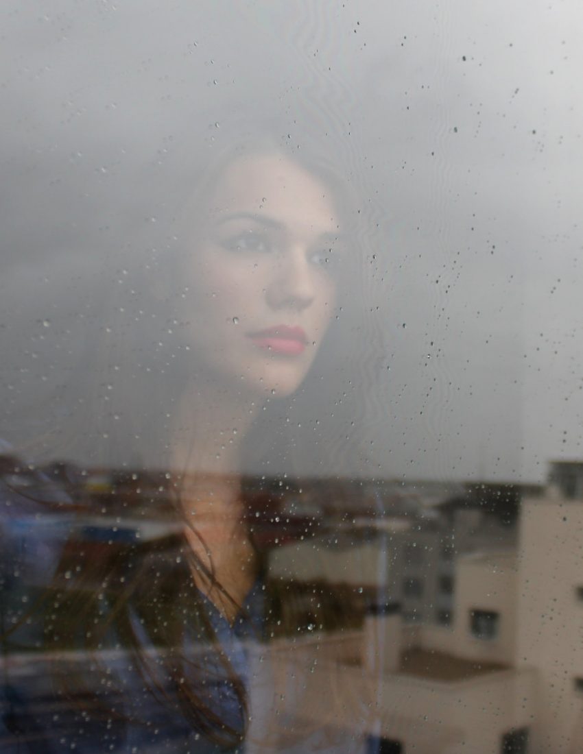 woman-at-window-looking-for-Restore woman-at-window-looking-for-Restore